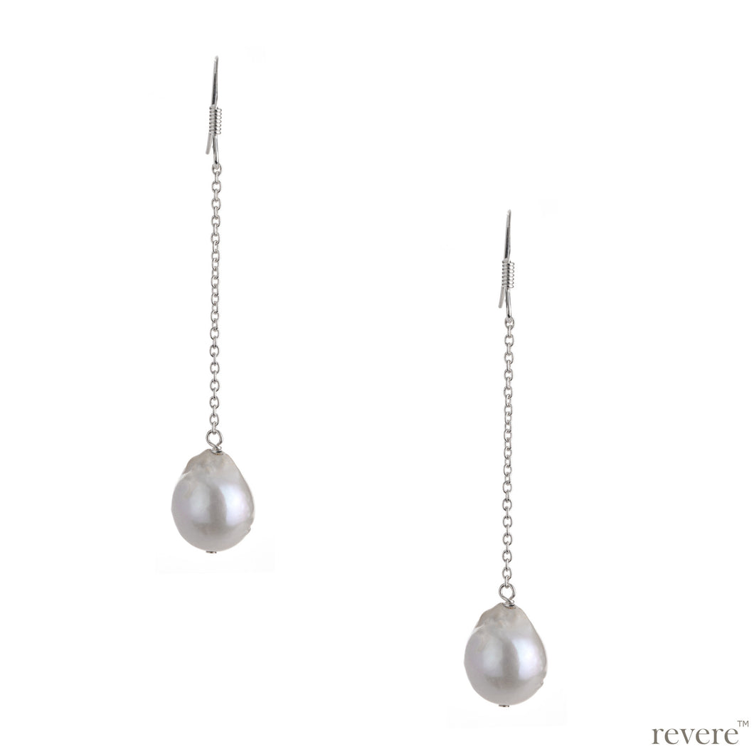 Express your attitude to the extreme with this pair of earring features white freshwater baroque pearl suspended on sterling silver string. Beat the epitome of styling and fashion with this remarkable earring!